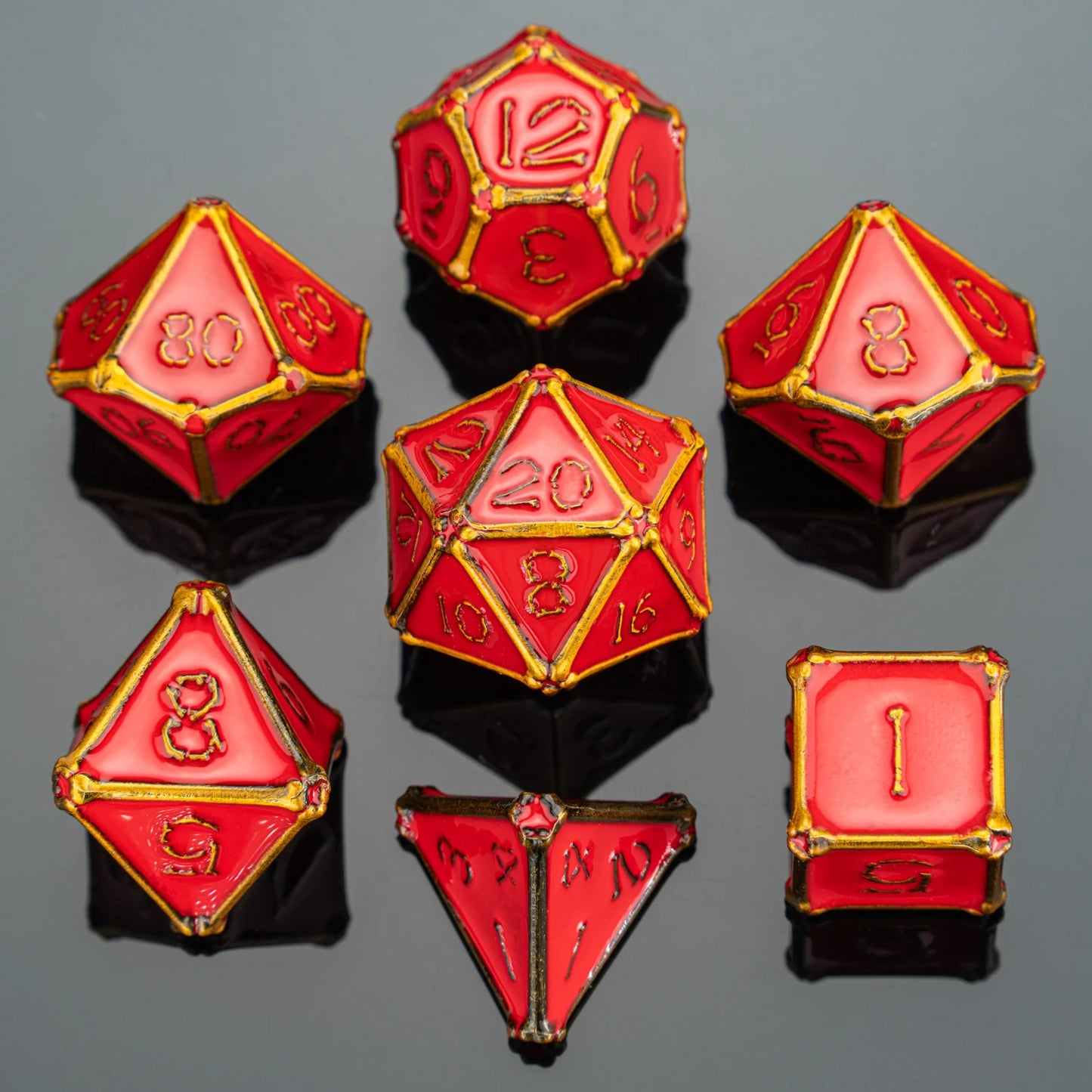 Bone Collector Dice Set - Gold w/ Red Solid Metal
