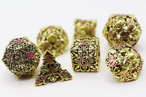 Fleur de Lis: Gilded Magenta Hollow Metal RPG Dice Set